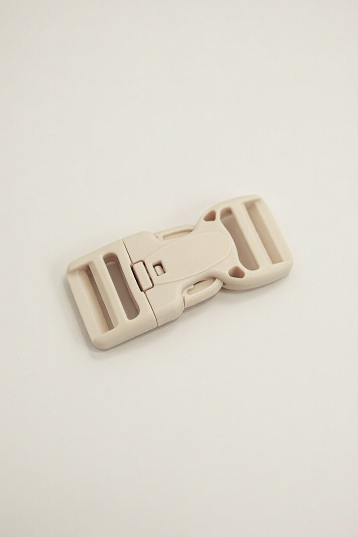Hebilla con botón de seguridad 25mm beige
