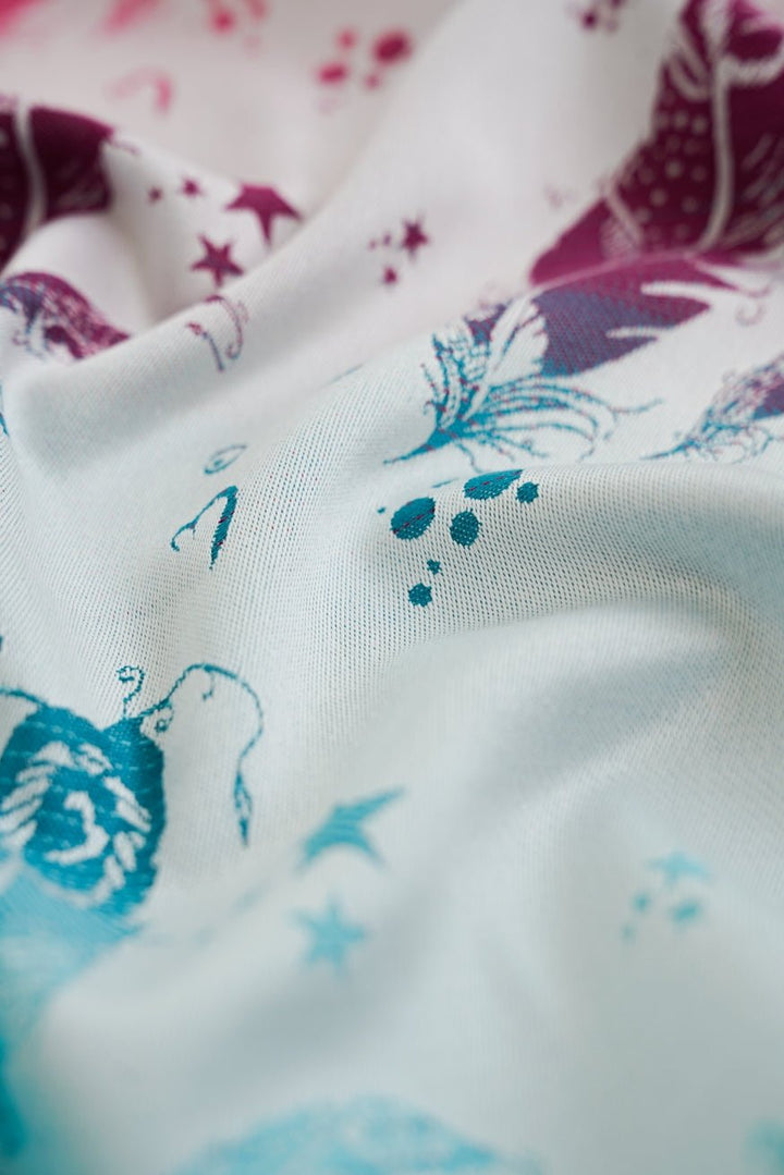 KOKADI Porte-Bébé WrapStar Plumes Hannah